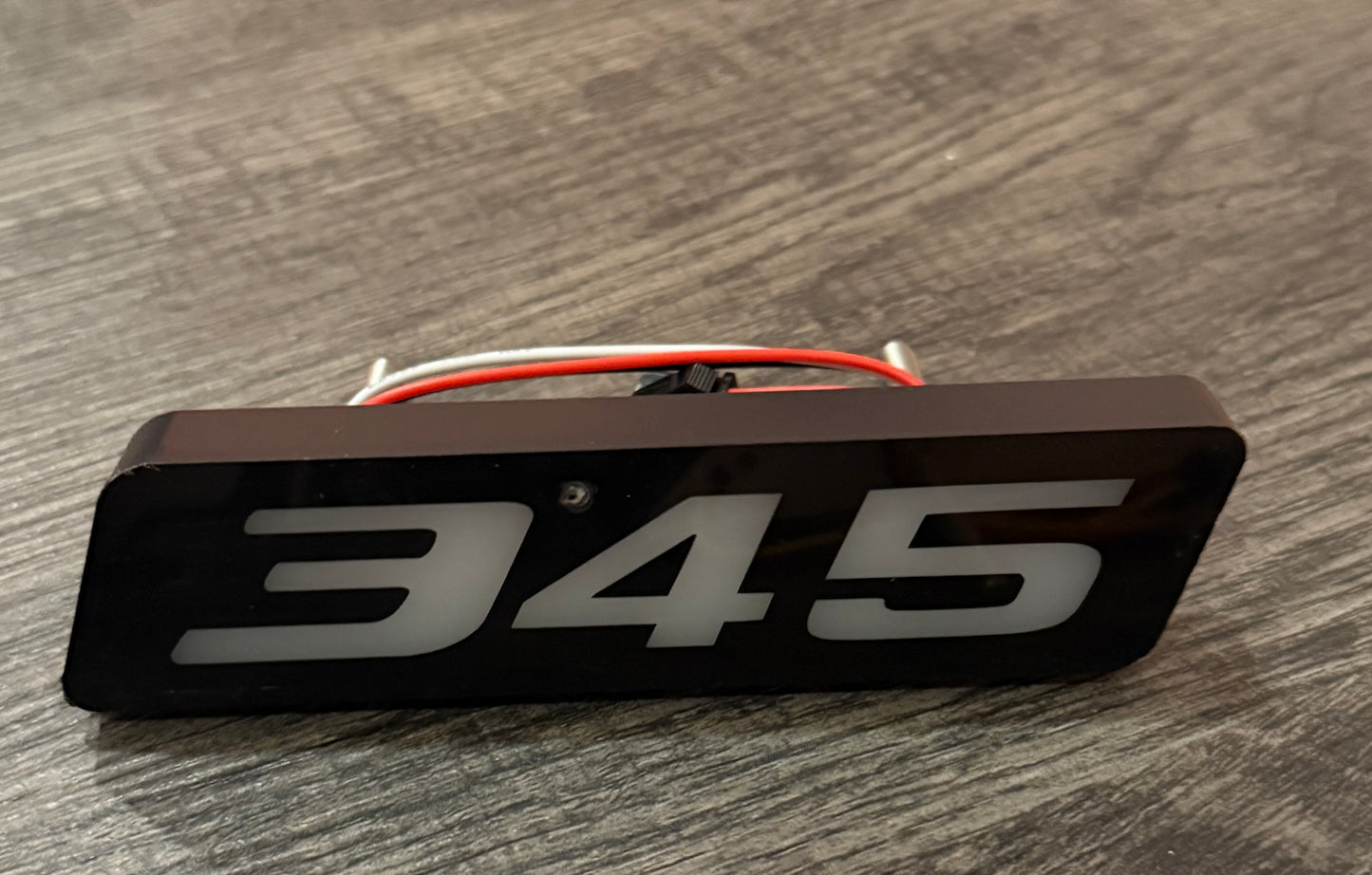 345 Flow Series Front Grille Emblem